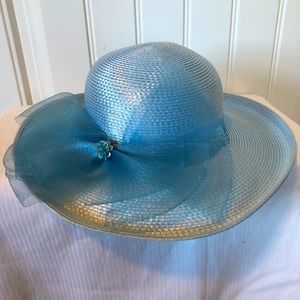 Blue straw hat with floral accent